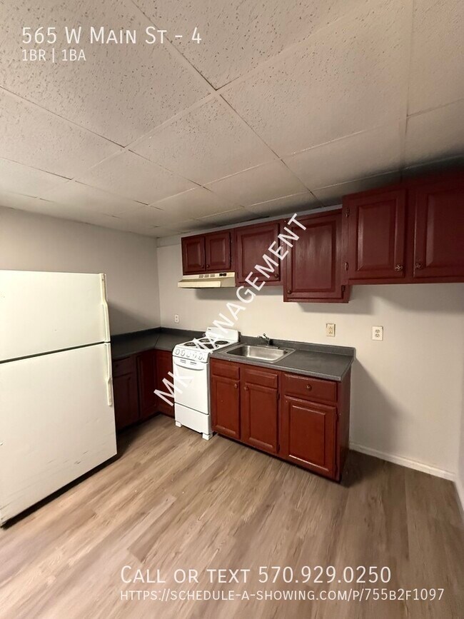 Foto del edificio - 565 W Main St