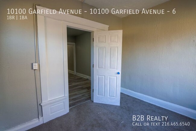 Building Photo - "Charming 1-Bedroom Oasis: Your Perfect Bl...