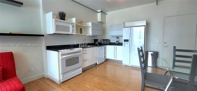 Building Photo - 690 SW 1st Ct