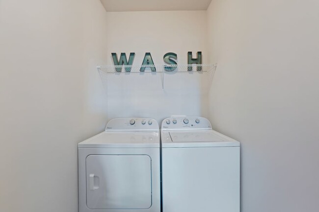 Full-size washer and dryer included in every apartment - Artisan Station Apartments