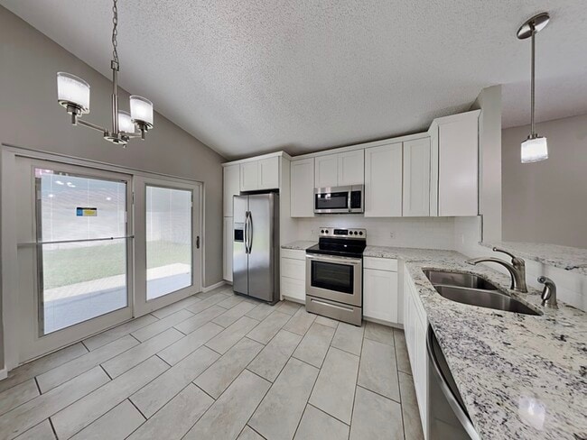 Building Photo - 6879 Belmar Dr