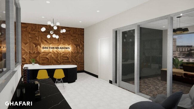 Apartment lobby with seating and coffee maker. - Breton 44