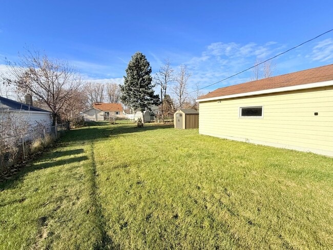 Building Photo - Move-In Ready 4-Bedroom Home with Massive Yard & Garage