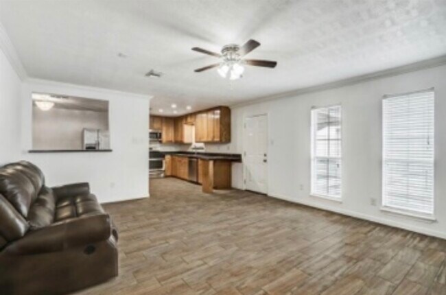 Living room looking into kitchen - 2606 Woodgate St