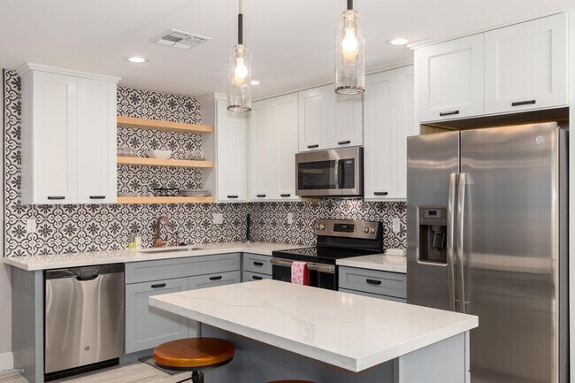 Foto del edificio - 6023 E Lewis Ave