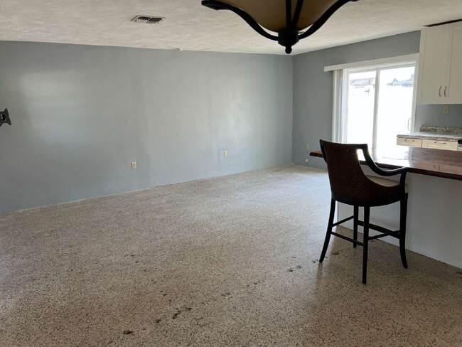 Building Photo - Charming 2-Bed Waterfront Retreat with Ter...