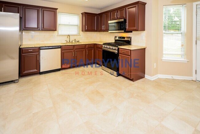 Building Photo - Be the first to Apply! BRIGHT and SPACIOUS...