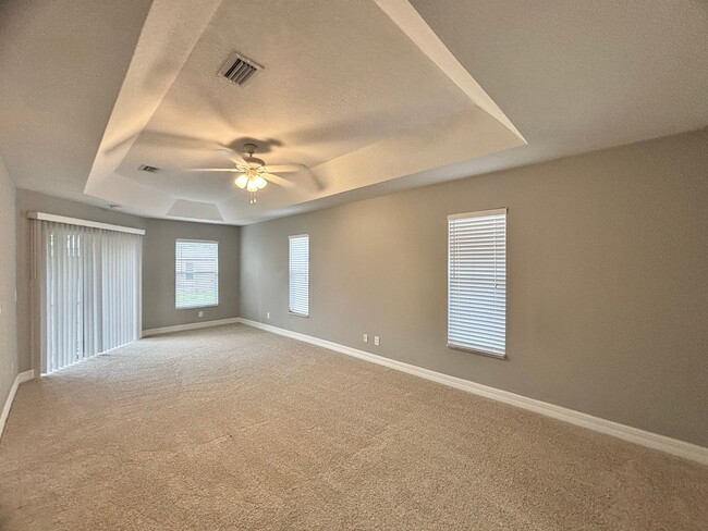 Building Photo - Spacious 4 Bedroom Home with 3 Car Garage,...