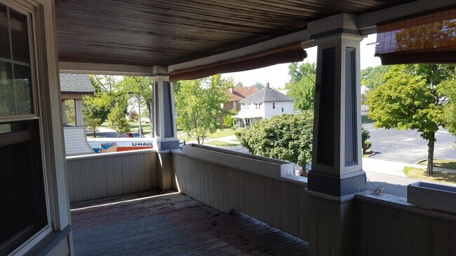 Enjoy the outdoors on the roomy front porch complete with garden boxes for tenants who care to use their green thumb! - 2021 Lincoln Ave