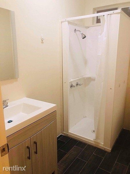 Building Photo - 1 br, 1 bath Apartment - 301 East 3rd Street