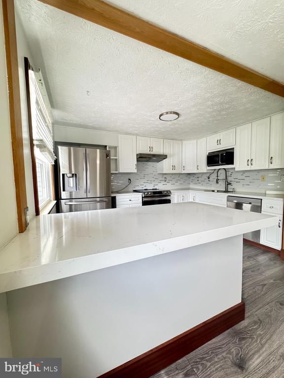 Building Photo - 8336 Claremont Woods Dr