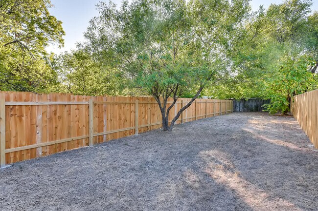 Large fenced back yard - 7606 Bethune Ave