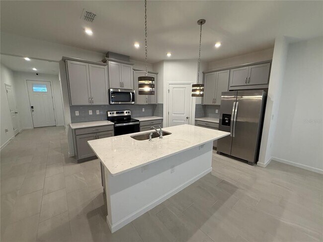 Foto del edificio - 1165 Lakeshore Breeze Pl