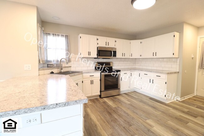 Building Photo - 4 bedroom home now available!