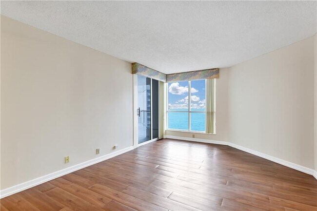 Building Photo - 6767 Collins Ave