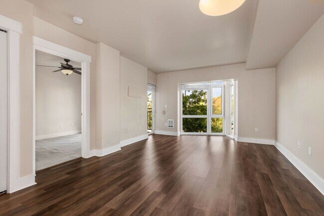 Building Photo - Modern 1-Bedroom + Den Condo with Parking, Storage & Rooftop Access – Marselle Condominiums