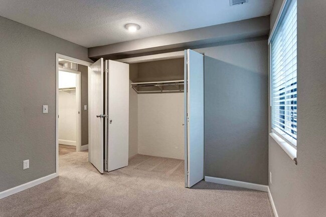 Bedroom and Closet - Glen Oaks East Apartments
