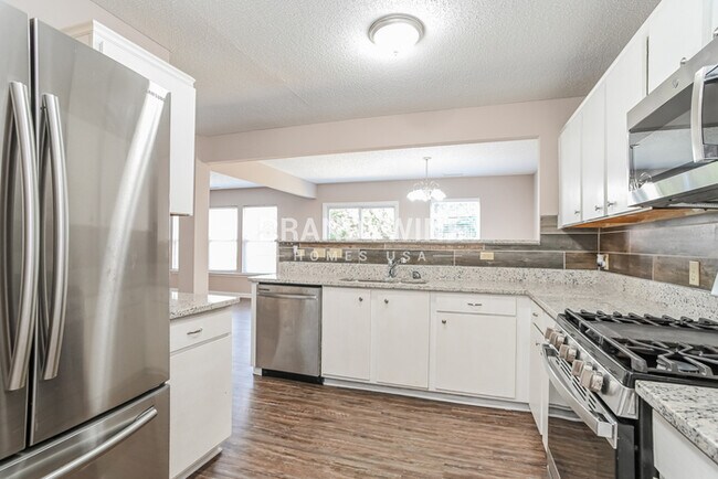 Building Photo - NEW LOWER RENTAL RATE LEASING SPECIAL: Rec...