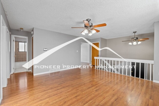 Building Photo - Spacious Split-Level Home in D20 with Mountain Views, 2 Car Garage, Fenced Yard and AC!