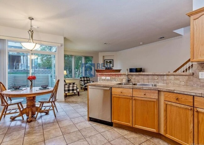 Photo - 8345 S Garland Cir Townhome