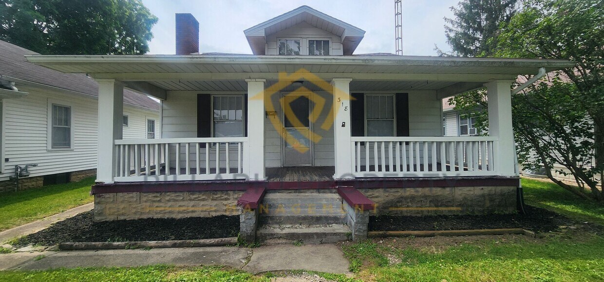 Primary Photo - Cozy 2-Bedroom & 1-Bathroom Home with Base...