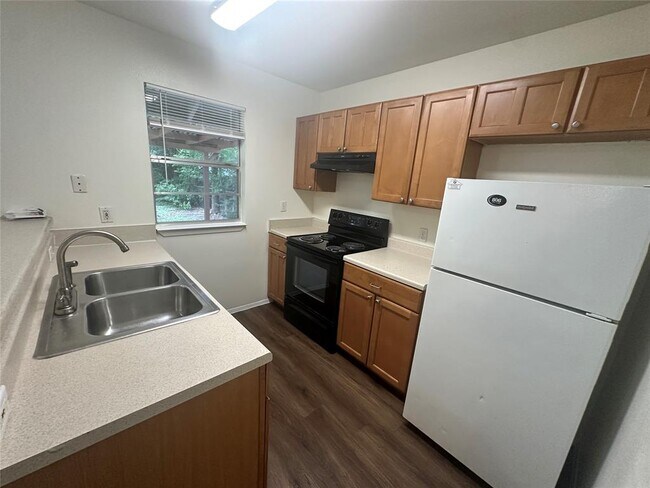 Foto del edificio - 8510 Woodstone Dr