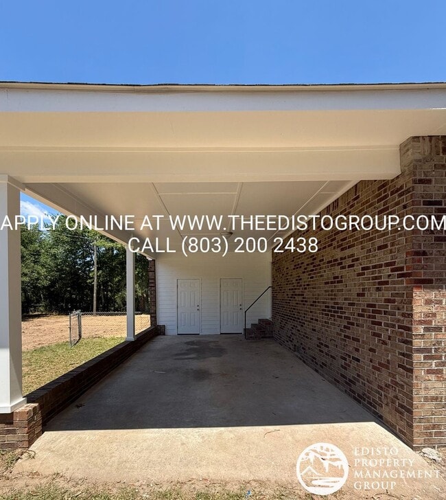 Building Photo - Updated 2BR Home with Large Yard & Carport Near Town