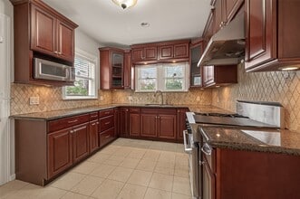 Building Photo - 7128 Staffordshire Blvd