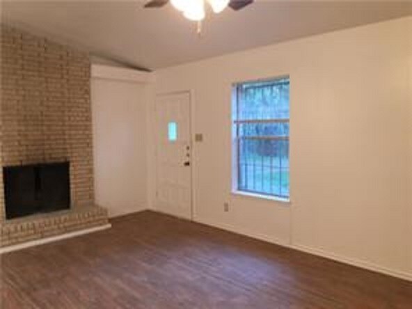 Living room with fireplace - 115 N Laurelwood Dr
