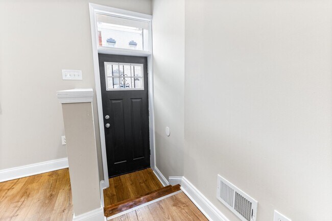 Building Photo - Parkside Haven: Contemporary 2-Bedroom Row...