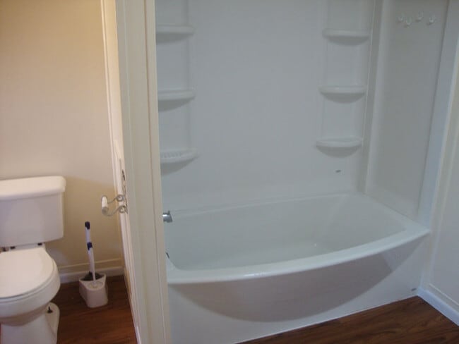 Full tub with shower. - 325 Mercer St