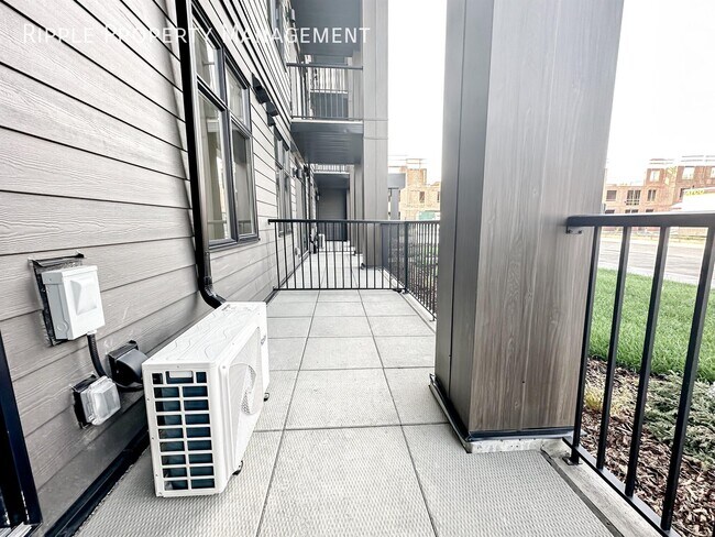Photo du bâtiment - BRAND NEW 2 BEDS/ 1 BATH CONDO IN THE COMMUNITY OF SETON
