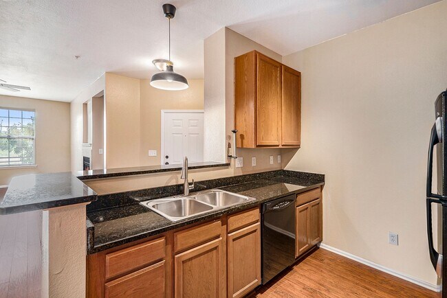 Building Photo - Two Bedroom Condo with Private Garage