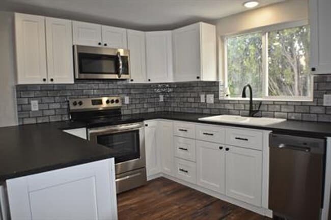 Photo - Beautiful 4 bed/2 bath available after 7/1... House