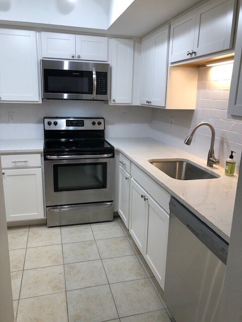 Kitchen - brand new cabinets and appliances - 1801 E Lake Rd