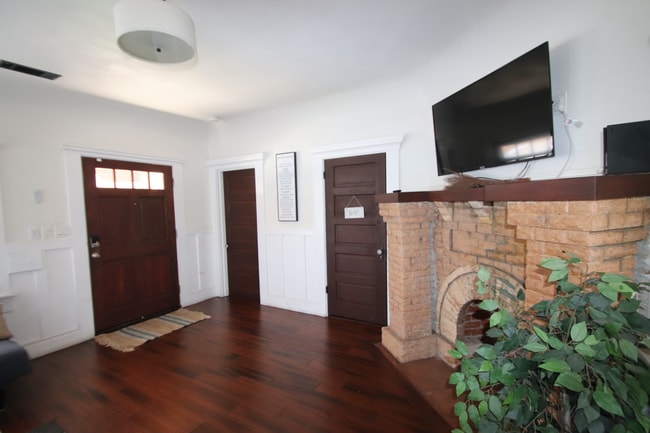 Living Room, newly weatherstripped heavy duty front door - 3458 Arlington Ave