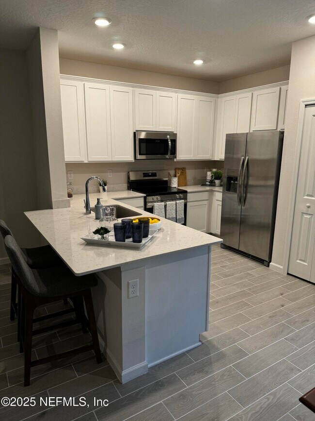 Foto del edificio - 4302 Leeward Breeze Lp