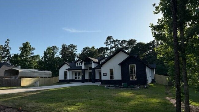 Building Photo - 34119 Conroe Huffsmith Rd