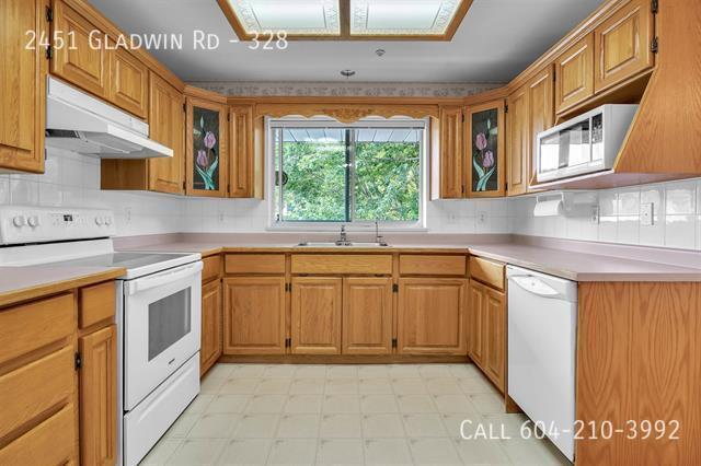 Building Photo - Spacious 55+ Condo with Elevator Access