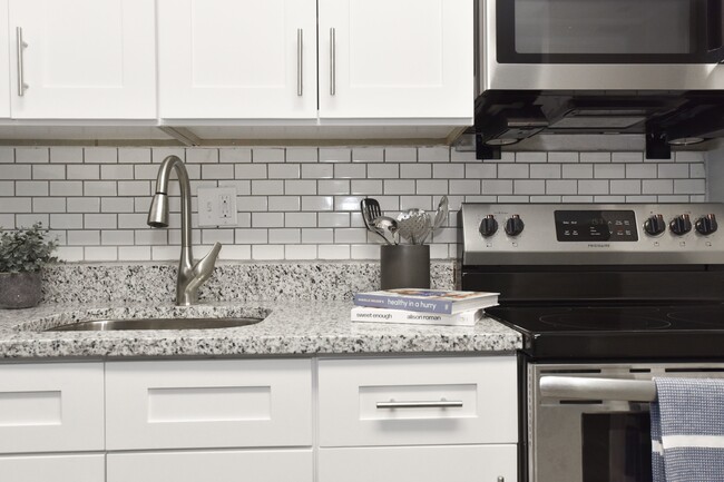 Kitchen + Granite Counters - Revere at Hamilton Place