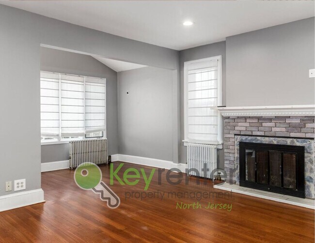 Building Photo - Spacious 3-Bed, 2-Bath Nutley Home with Bonus Office, Multi-Level Deck & Quiet Location