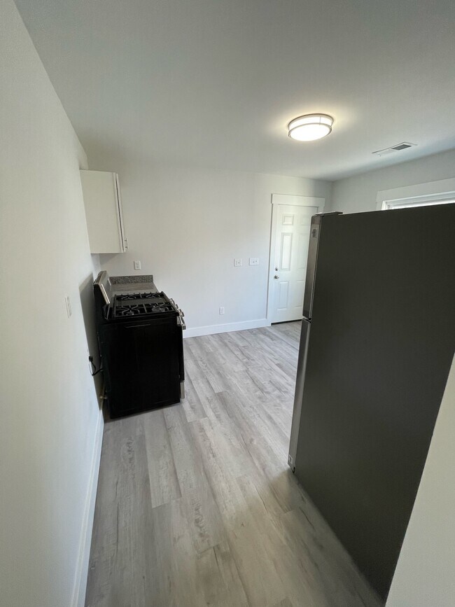 Kitchen from hallway - 1238 Highway Ave