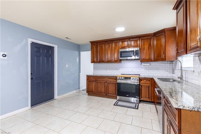 Building Photo - Welcome to this beautifully maintained 4-bedroom! "ASK ABOUT OUR ZERO DEPOSIT"