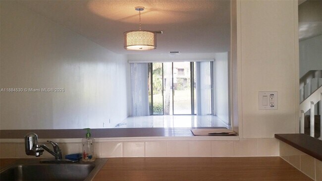 Building Photo - 4599 Carambola Cir S