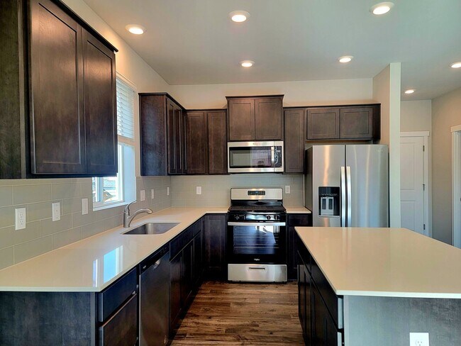 Building Photo - Brand New 3 bed with loft and fully fenced yard in convenient CK location!