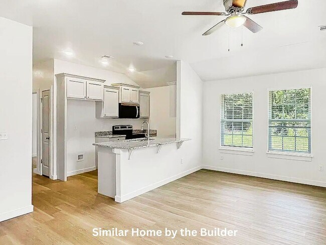 Building Photo - Fresh & New! 3 Bed Home with Stylish Interior + Fenced Yard