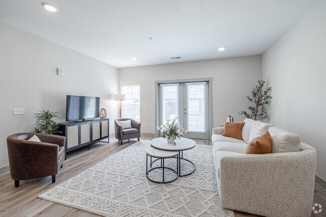 2BR, 2BA - 1,087SF - The Shoreline -STAGED Living Room - Mona Shores Flats