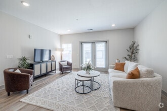 2BR, 2BA - 1,087SF - The Shoreline - Living Room - Mona Shores Flats