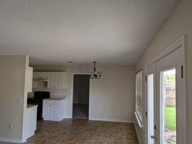 Building Photo - Updated 4-Bedroom Home on a Quiet Street — 1,695 sq ft, Large Garage — Now Accepting Applications