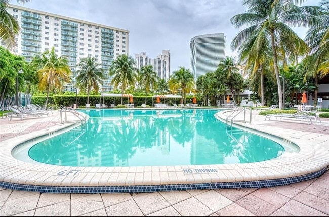 Building Photo - 19380 Collins Ave